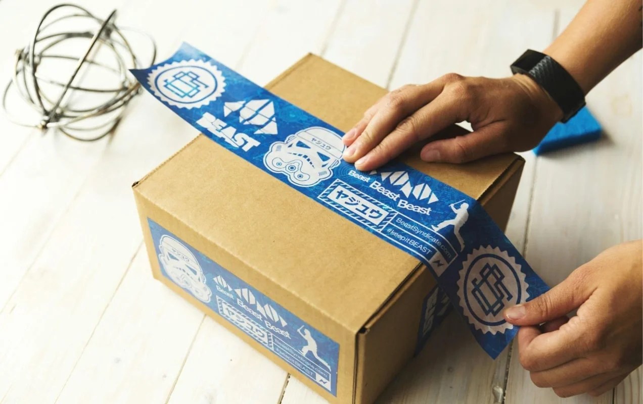 taping a box and preparing to ship