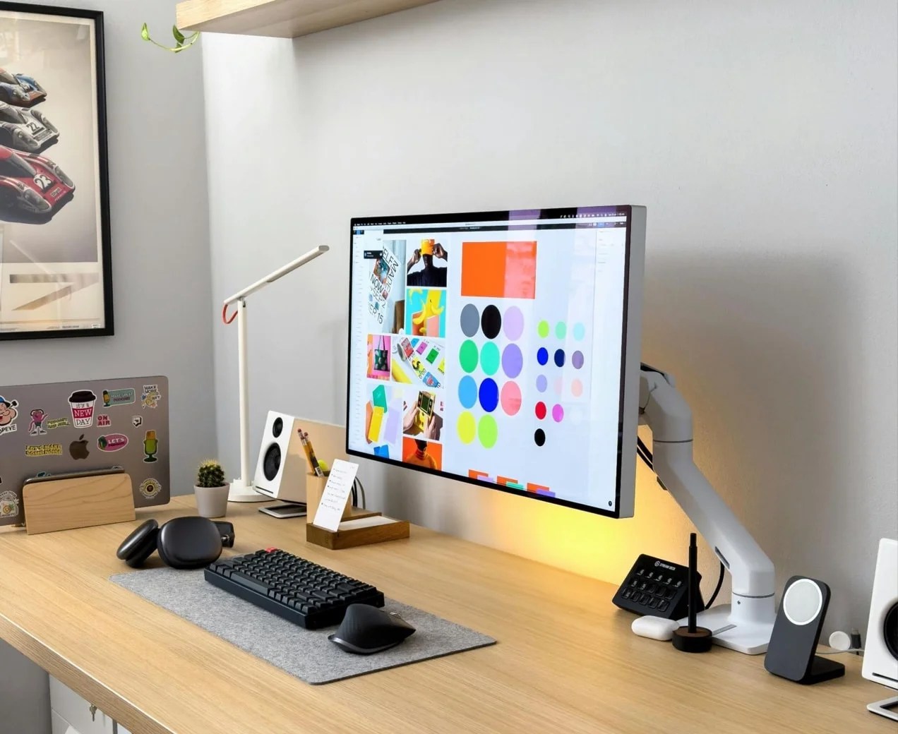 computer with a mood board and color palettes on the screen